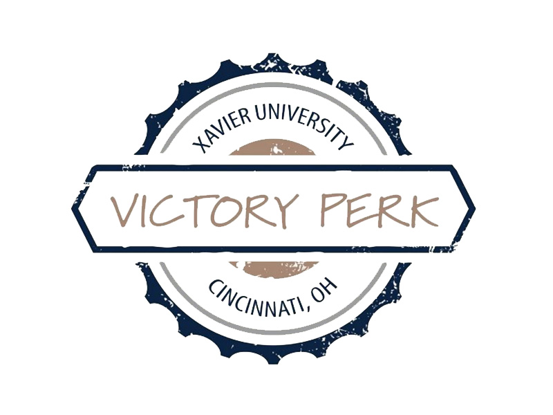 Victory Perk logo. Logo is a white circle outlined in blue. Text reads 'Xavier University Victory Perk Cincinnati Ohio'