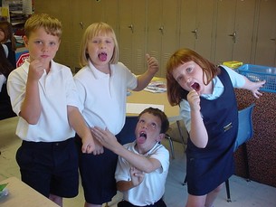 Photo of Children in School-Issued uniformed for Catholic Schools