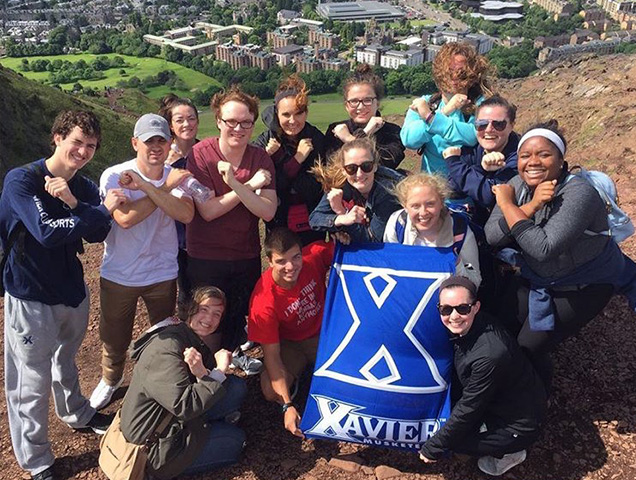 Group of students holding a Xavier Flag in Edinburgh, Scotland
