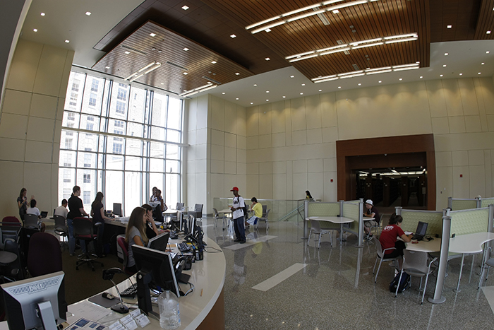 Library connected to first level of Conaton Learning Commons, where students are studying photo