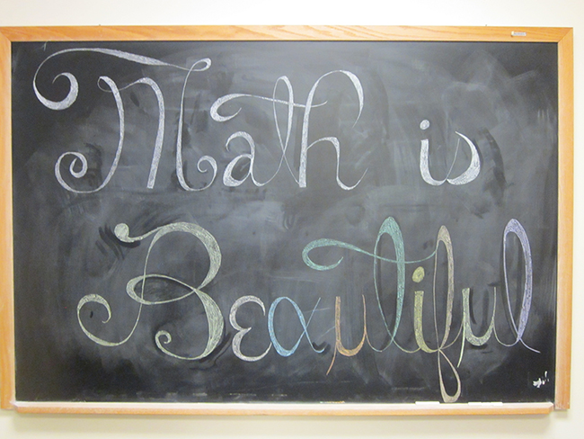 Math is Beautiful written on a chalkboard
