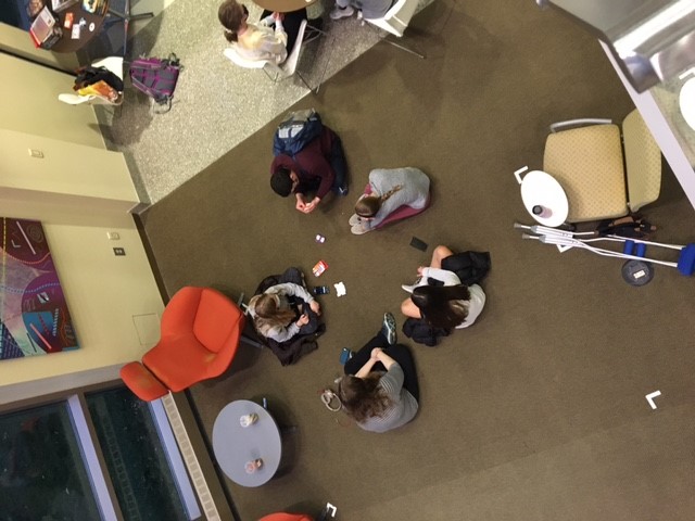 Aerial view of students sitting in circle