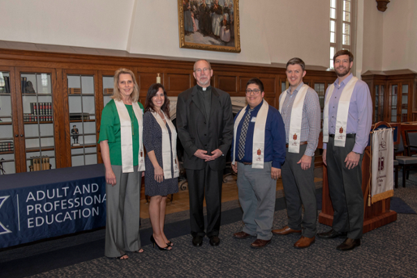 Group Photo of ASL members with Fr. Graham in the middle