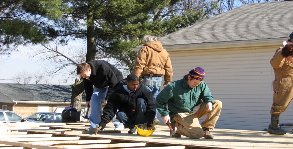 Volunteers working on a house. 