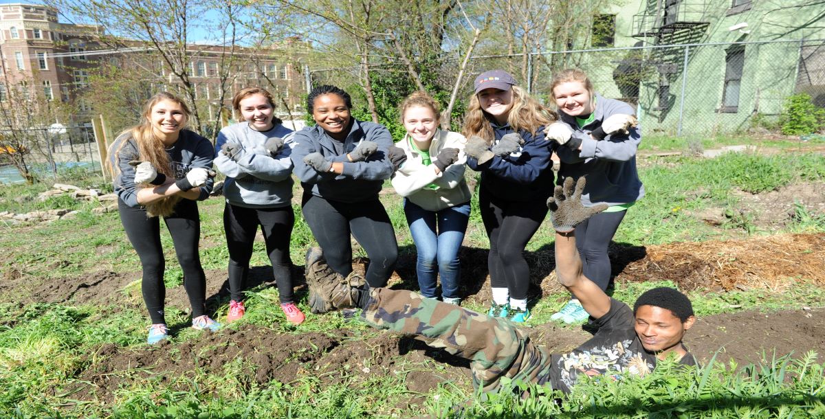 Volunteers working on landscaping. 