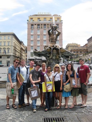 Students taking a group photo while on a Study Abroad trip in Rome
