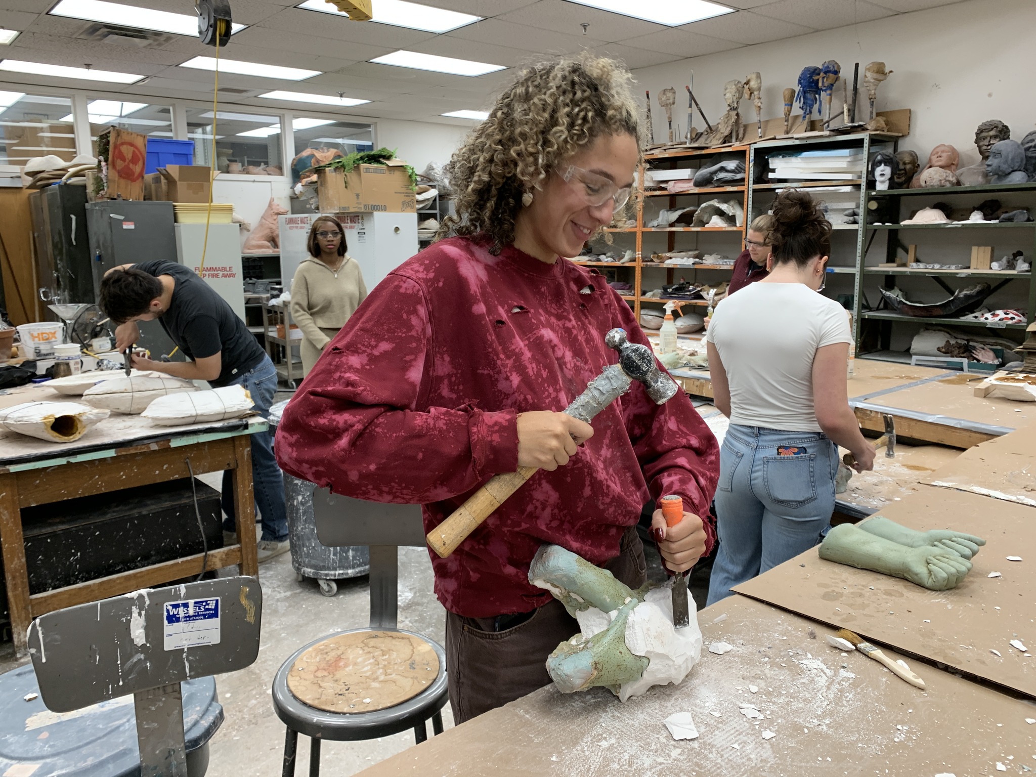 Xavier Art students working in the sculpture studio