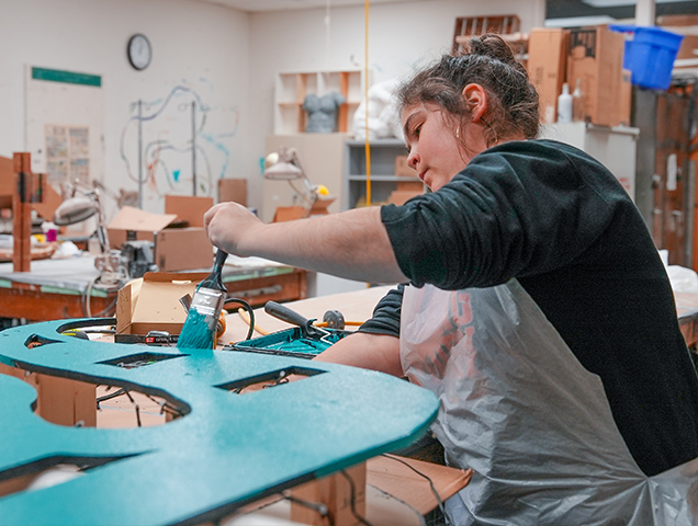 Art major working in a ceramics studio