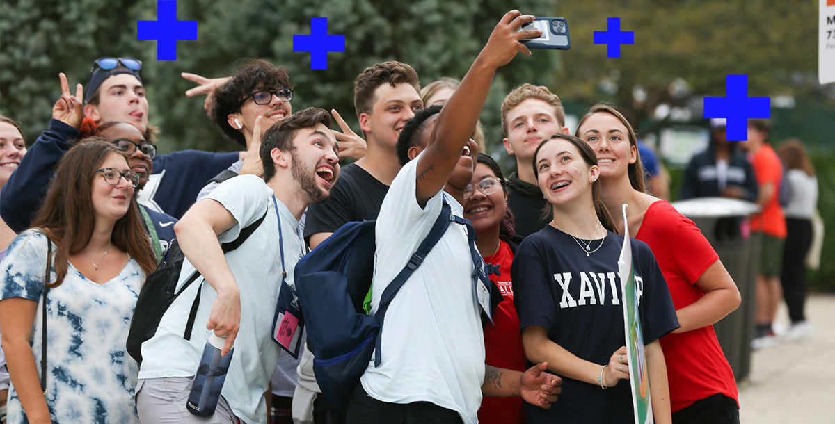 First-year students walking in front of the campus chapel