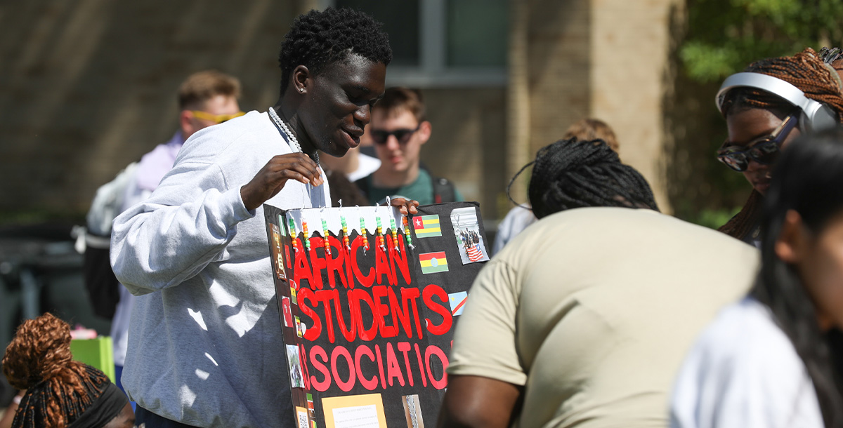 Student in the African Student Association talking about the club during club day