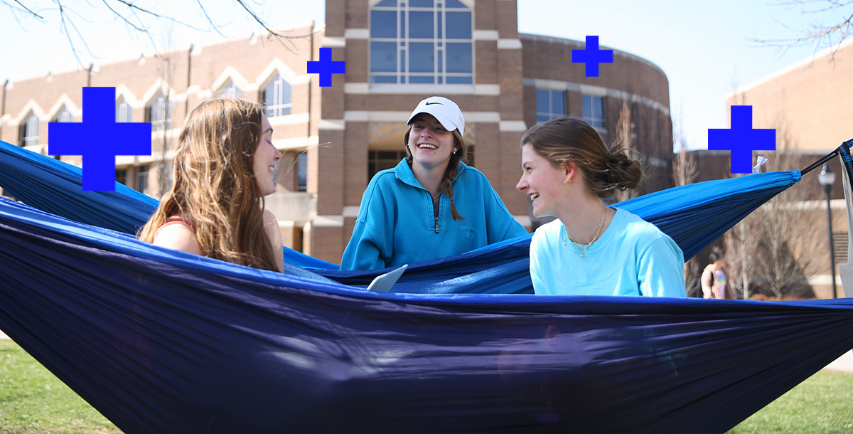 Two Xavier students smiling on move-in day