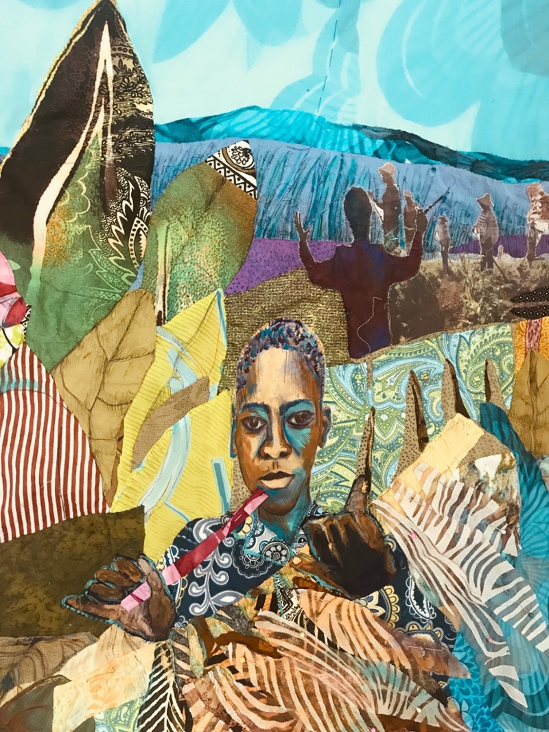 A photo of a quilt collage art work, created by artist Angela Franklin. There are many colors and one black child in the center who is looking back at the viewer.
