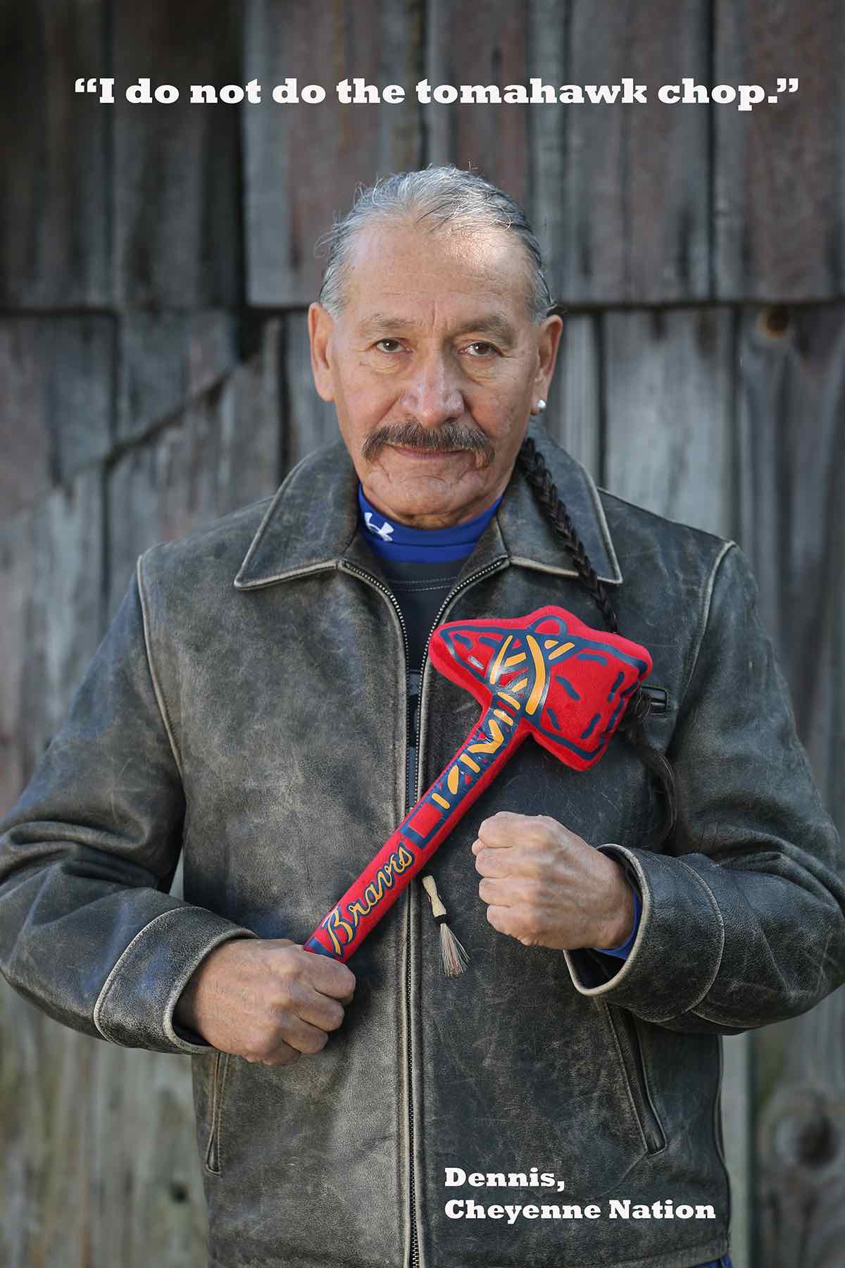 Photo of a man holding a tomahawk. Text on the photo reads "I do not do the tomahawk chop." Dennis, Cheyenne Nation