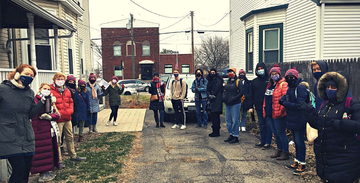 Students gathered in winter in a Cincinnati neighborhood outside