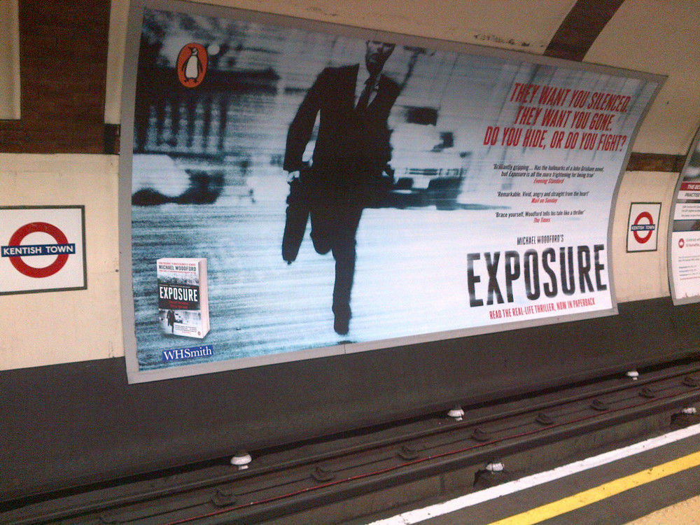 London Tube Station with ad for Exposure novel
