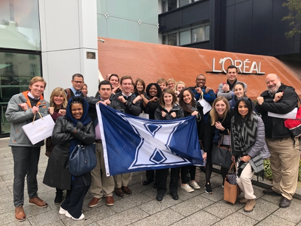 Group Photo of XU Business Students and Faculty