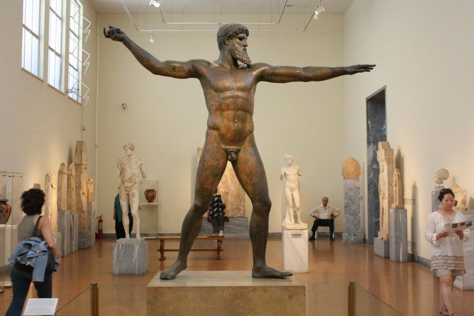 Statue of a Greek god in a museum