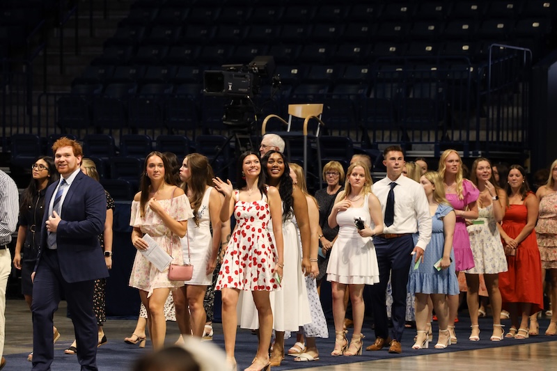 Students walking to their seat in the Nursing Pinning Ceremony
