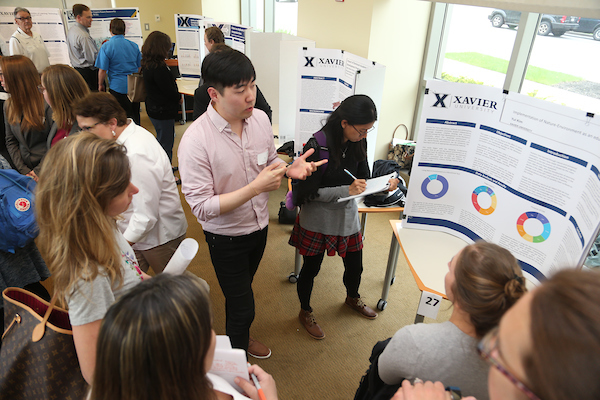 Photo of Students showing off their Projects