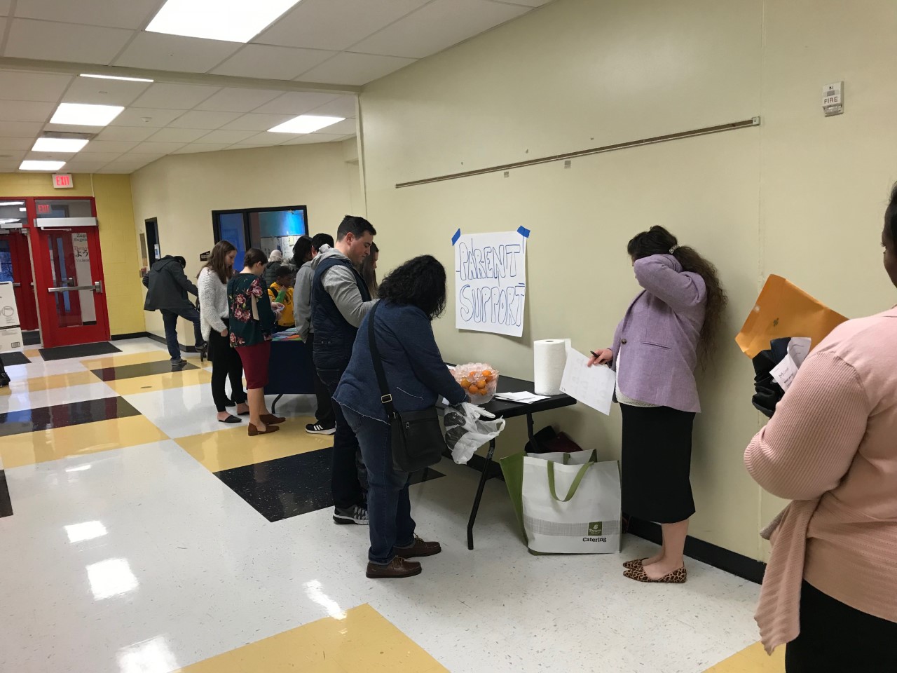 Students working on Posters inside a Classroom building