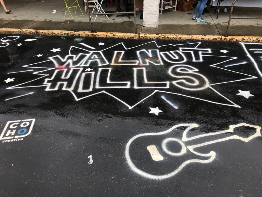 Photo of Street Artwork that read's 'Walnut Hills'