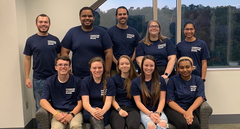 Photo of Commuter Activities Board Members wearing 'CAB' T-shirts