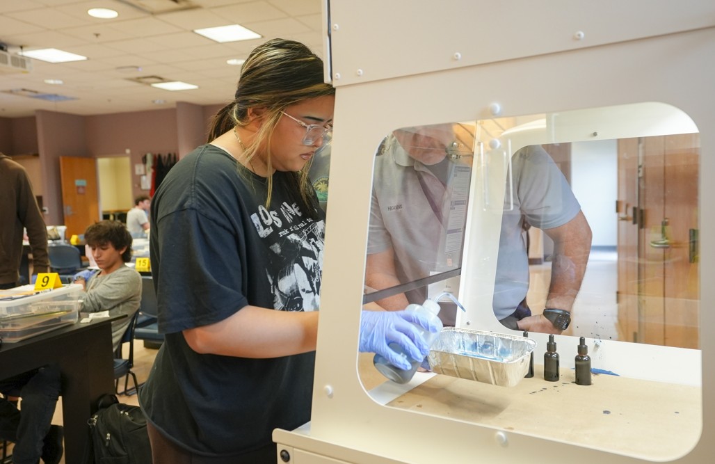 Student at fumehood
