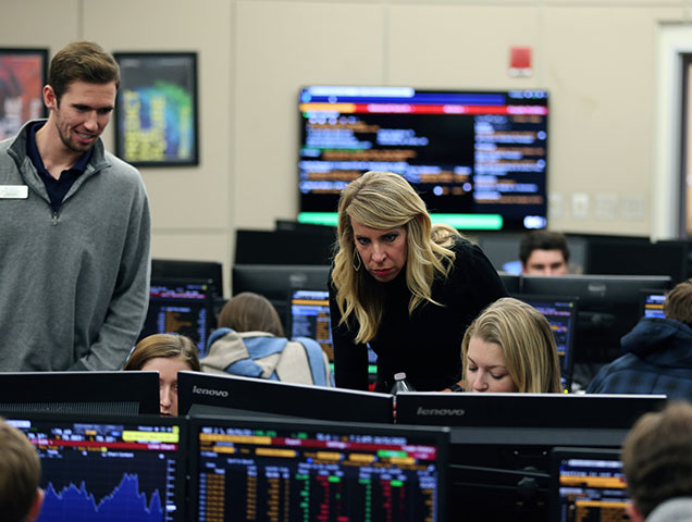 Finance majors working inside Xavier's 5/3 Trading Center