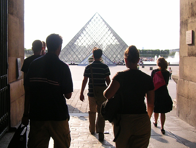 Xavier Students walking toward the Louvre museum in Paris