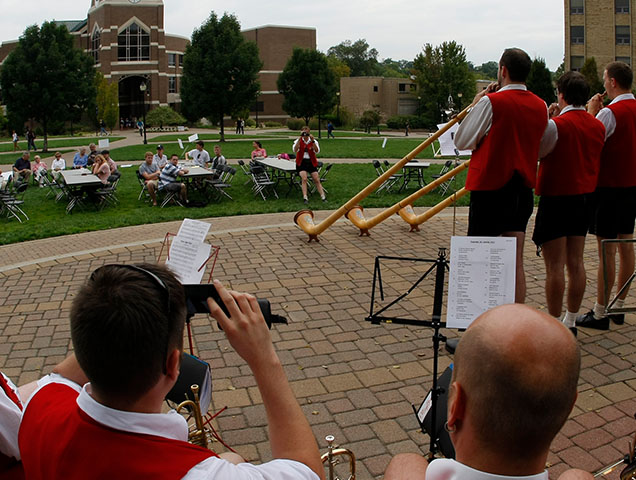 German majors listening to live traditional German music on campus