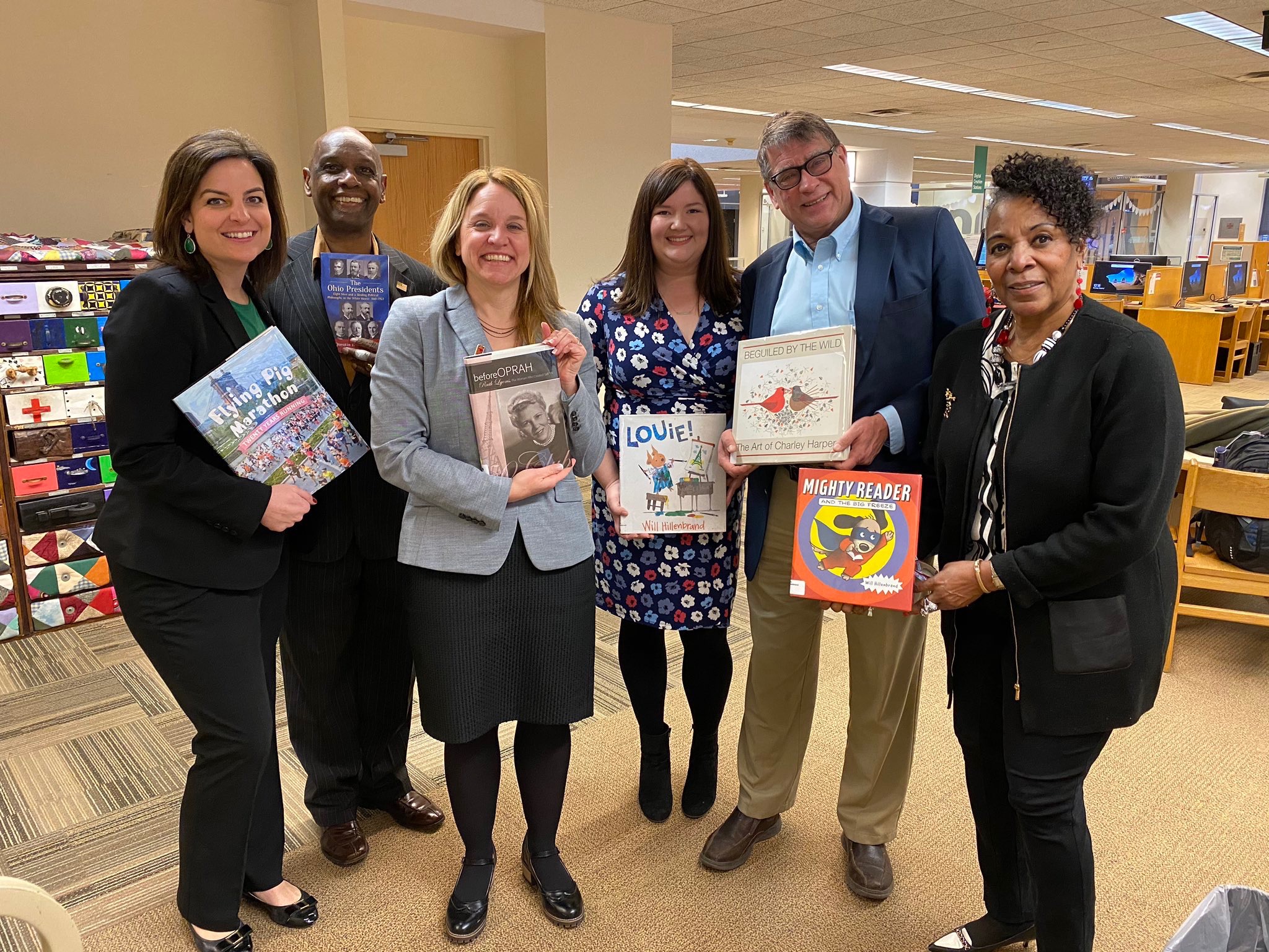 brigid-with-colleagues-books.jpeg