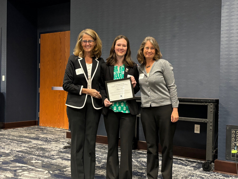 Public Service Scholarship for 2026 awarded to Megan Cooper by Dr. Kathleen Smythe and University President Colleen Hanycz