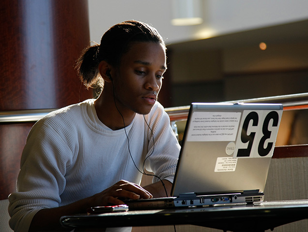 student using a laptop