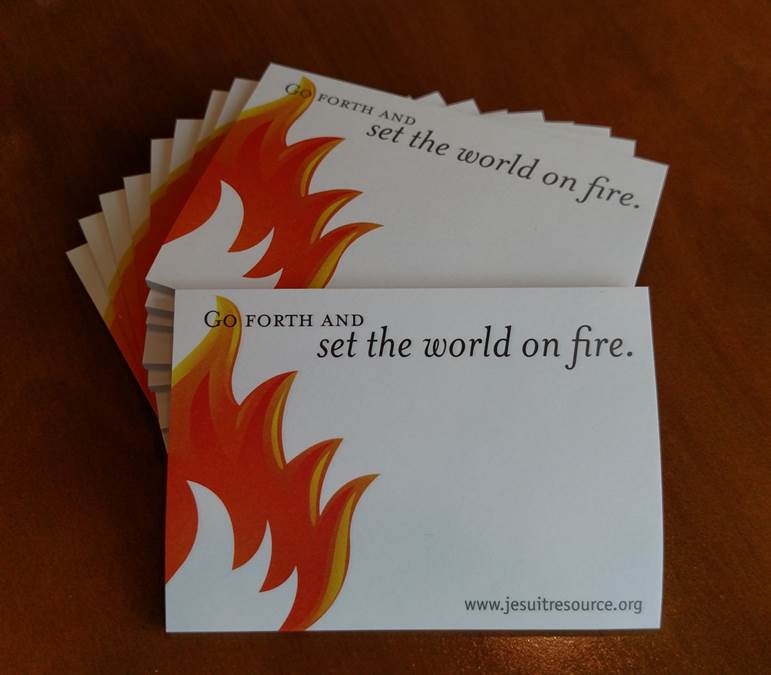 Stack of post-it notes with flames on them.