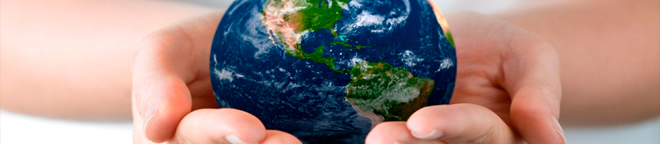 Hands holding a Globe of Earth