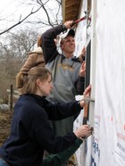 Xavier Students building a house