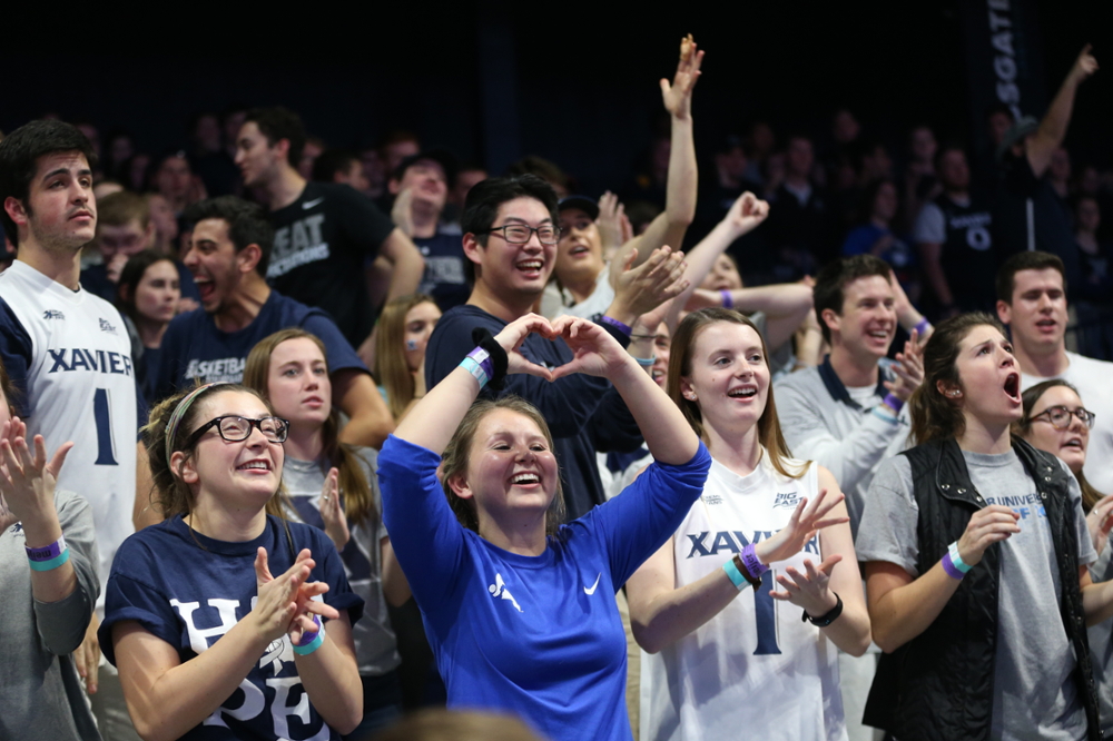 Xavier students cheering at basketball game