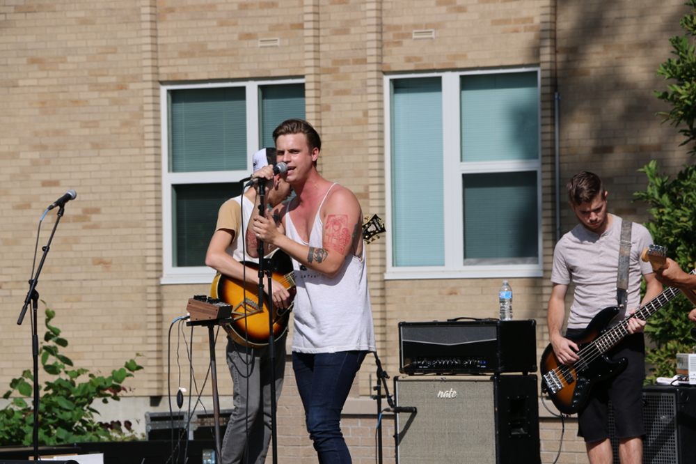 Xavier students performing music on campus