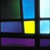 Close up of stained glass, fused in square shapes