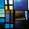 Close up of stained glass, fused in square shapes