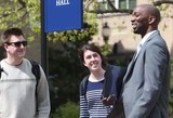 Professor teaching to students outside