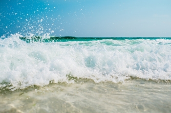 Waves crashing on beach