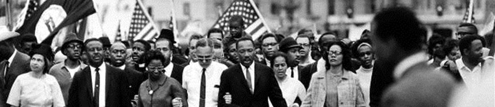 a picture of Martin Luther King Jr. marching alongside other protestors