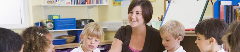 Teacher and students smiling