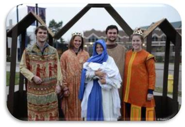 People portraying Mary, Joseph, and the three Wise Men.