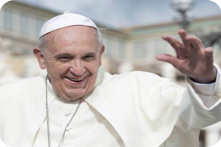 Pope Francis wearing white, smiling and waving