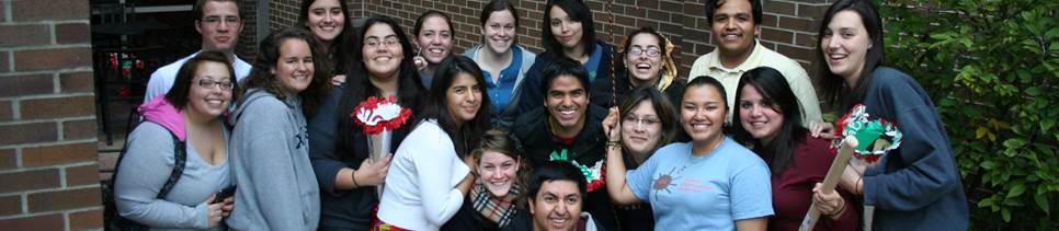 Photo of a group of people of the Latino and Hispanic ethnicities, all smiling