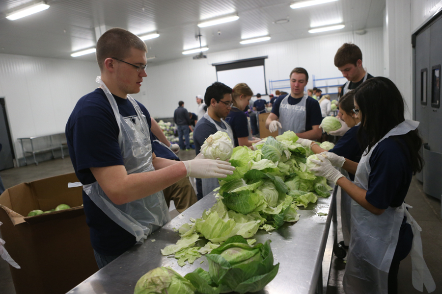 People working in a soup kitchen