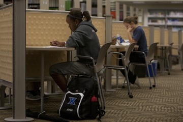 Students studying inside the Library photo