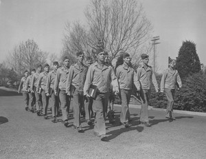 Members of the 30th College Training Detachment march along University Drive in 1943. Photo from the Xavier University Photograph Collection.